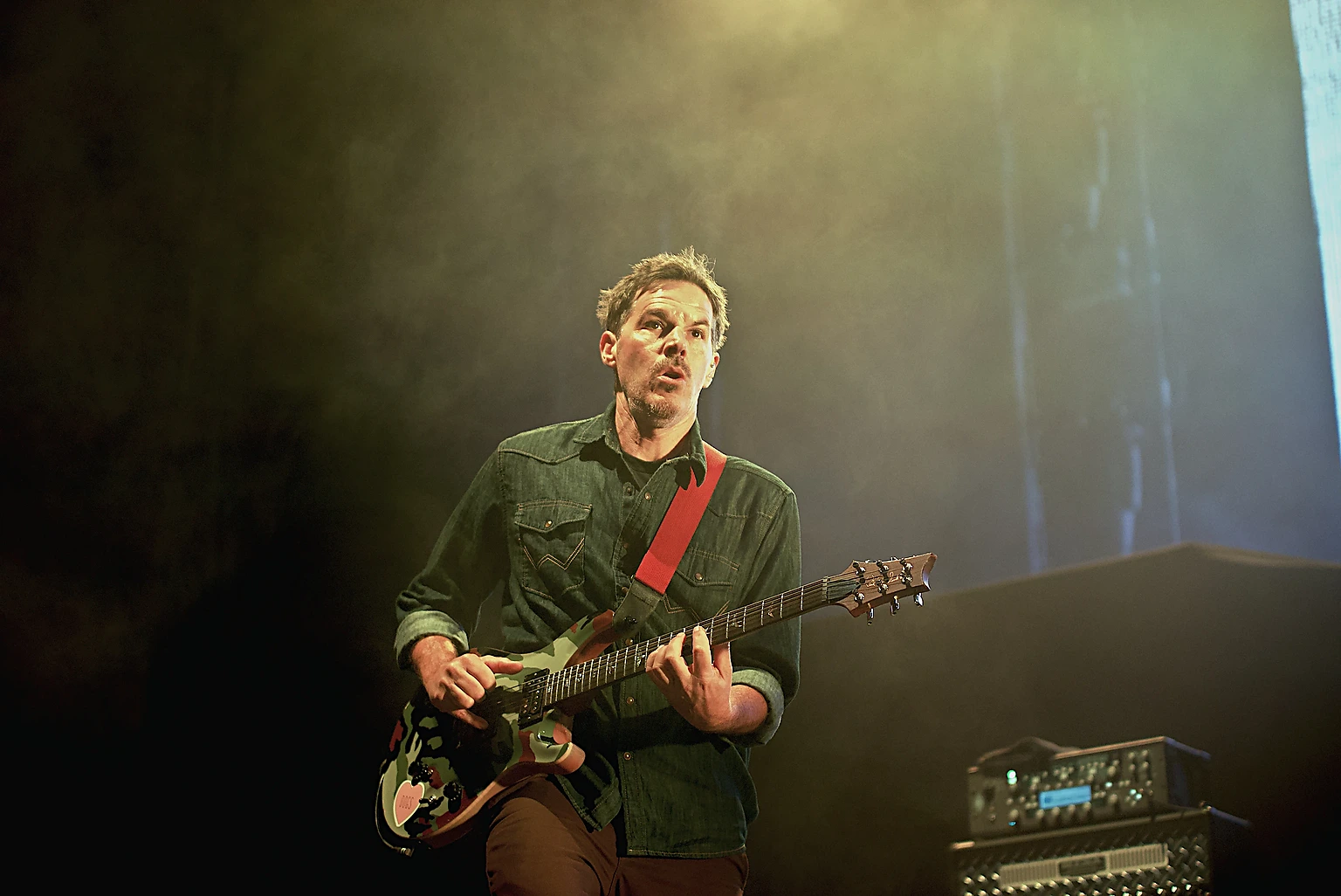 Hoobastank guitarist playing in stage haze at Toyota Arena, Ontario