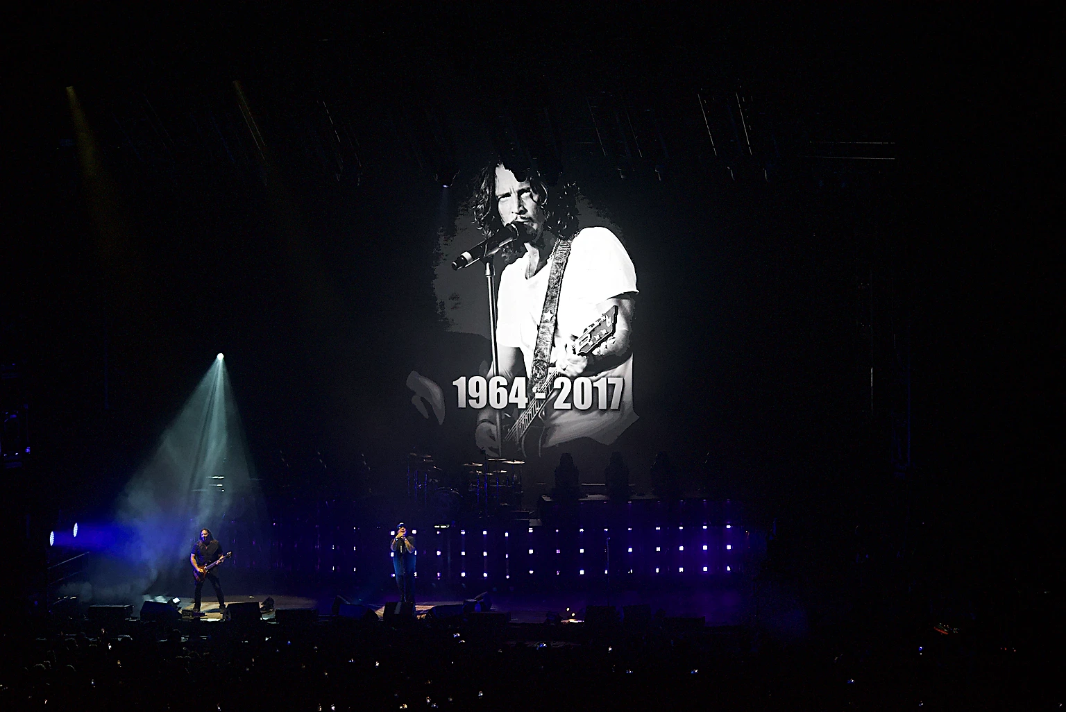 Chris Cornell portrait marked 1964 to 2017 on the arena screen during Staind's tribute to fallen rock artists at Toyota Arena, Ontario